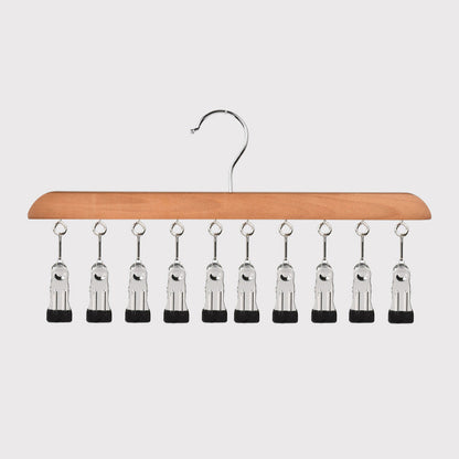 Holzbügel mit mehreren Clips für die Kleiderschrankorganisation